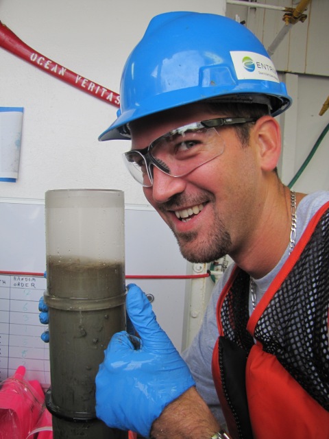 Michael Jessich of Entrex and a freshly cored sediment sample